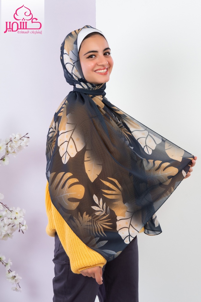 Scarf with yellow tree leaves and a black background